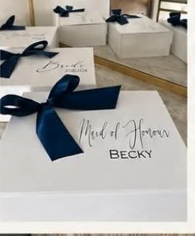 Personalised bridal party gift boxes with navy ribbon
