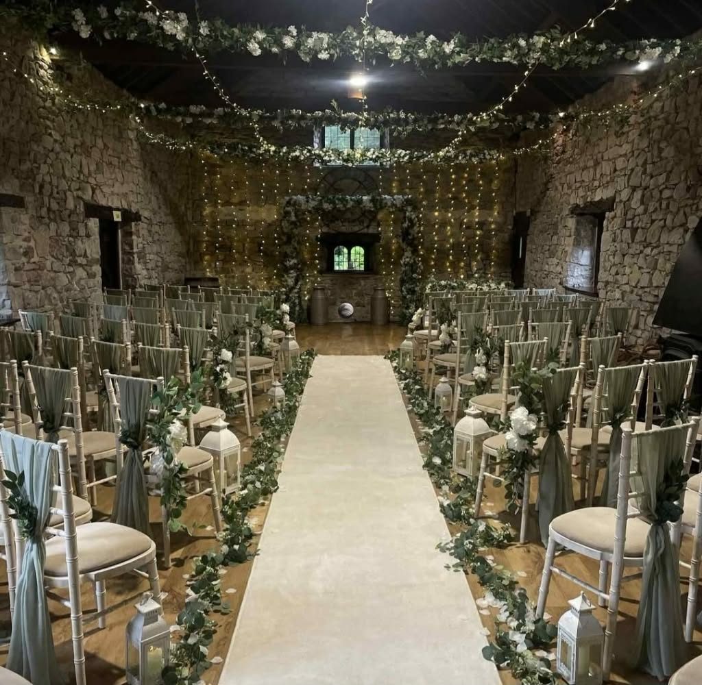 A wedding ceremony room dressed by Simply Elegant Hire